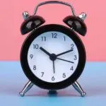 Cute and stylish metal alarm clock, creative children's bedside mini clock.