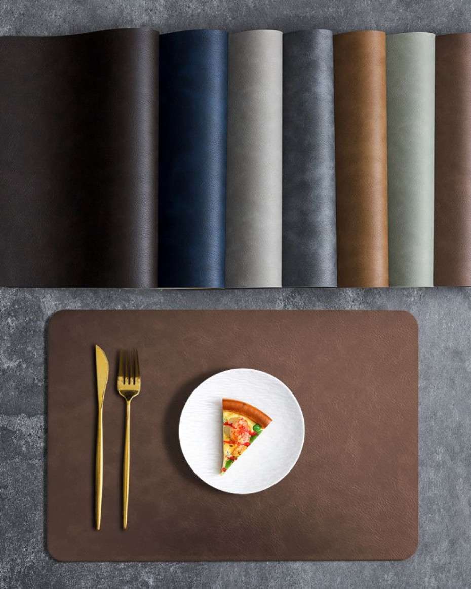 fc3c49df5843aa3649307faca5307ed00a12fe64.jpeg Leather Waterproof Heat Insulated Dining Mat - Image 1