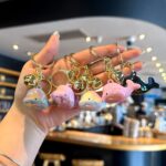 Creative electroplated iridescent dolphin acrylic keychain pendant, cute color-changing bell, colorful student backpack pendant - Image 2